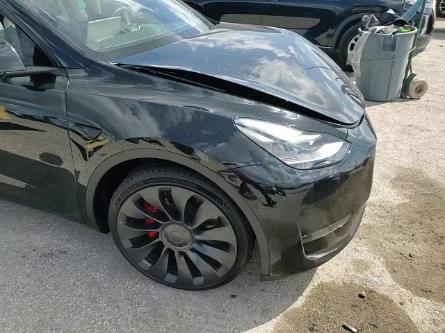 2023 Tesla Model Y VIN: 7SAYGDEF1PF803207 Lot: 84888465
