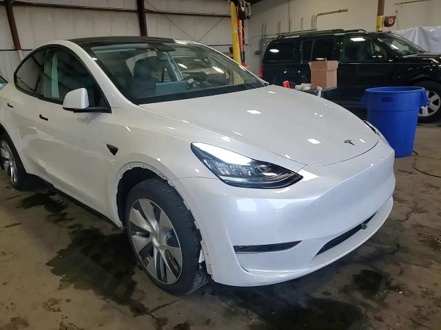 2023 Tesla Model Y VIN: 7SAYGDEE1PA117947 Lot: 82115595