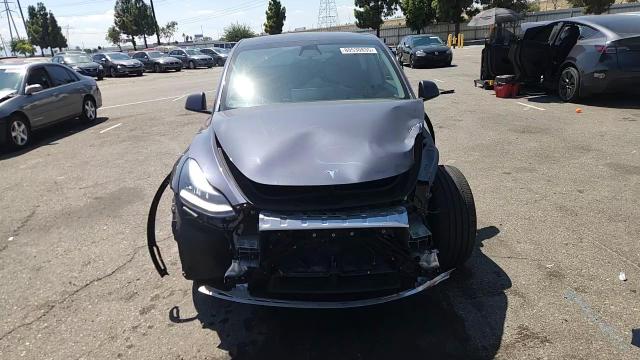2022 Tesla Model Y VIN: 7SAYGDEE7NF396711 Lot: 80530835