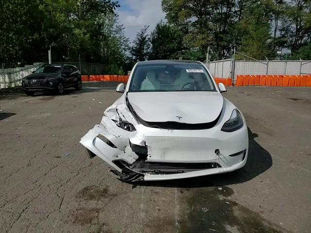 2022 Tesla Model Y VIN: 7SAYGDEF0NF388524 Lot: 80245715
