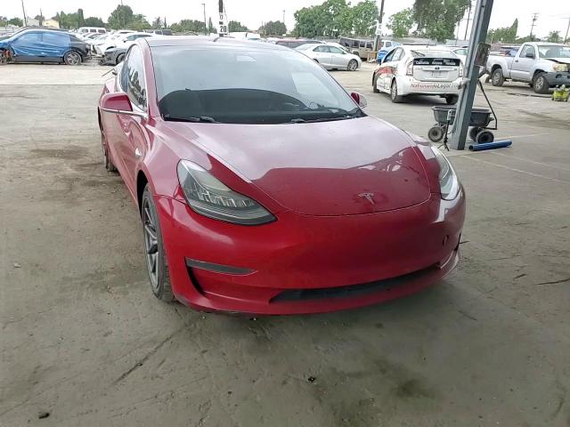 2018 Tesla Model 3 VIN: 5YJ3E1EB5JF056047 Lot: 84402705