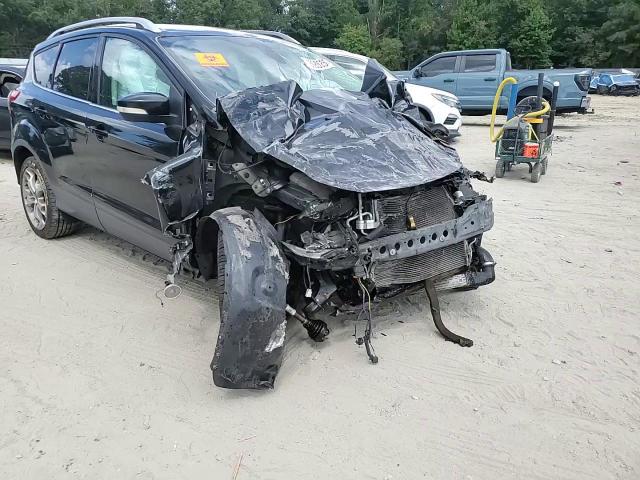 2014 Ford Escape Titanium VIN: 1FMCU9J93EUB69704 Lot: 71398535