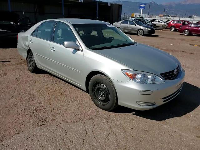 2004 Toyota Camry Le VIN: JTDBE32K940272997 Lot: 71156415