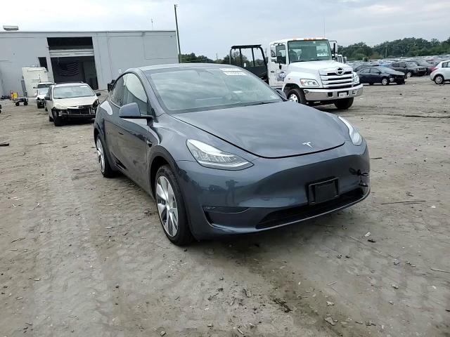 2023 Tesla Model Y VIN: 7SAYGDEE5PA096777 Lot: 84195225