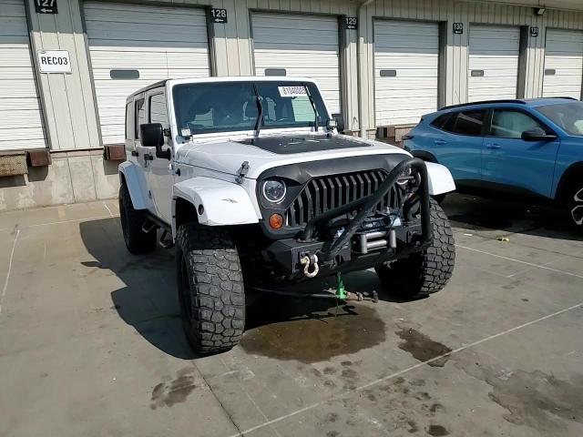 2011 Jeep Wrangler Unlimited Sahara VIN: 1J4BA5H18BL623829 Lot: 81040005