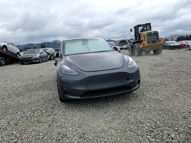2023 Tesla Model Y VIN: 7SAYGDEF0PF889285 Lot: 84559765