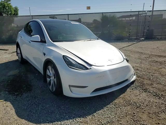 2023 Tesla Model Y VIN: 7SAYGAEEXPF781214 Lot: 83774475