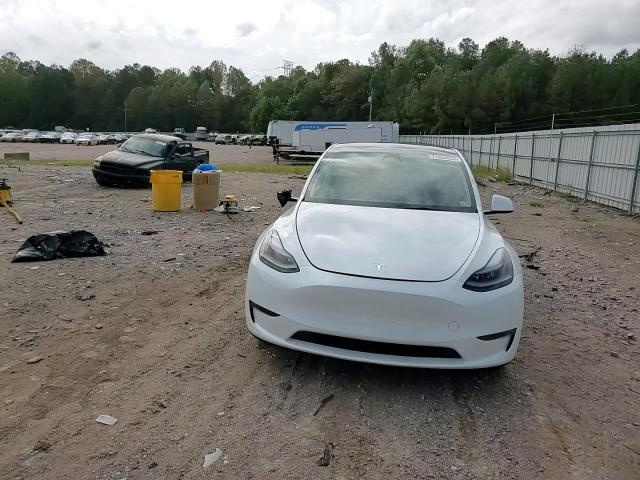 2023 Tesla Model Y VIN: 7SAYGDEF1PF665541 Lot: 71634055