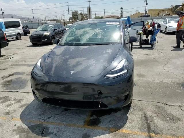 2025 Tesla Model Y VIN: 7SAYGAEE7SF305480 Lot: 70413335