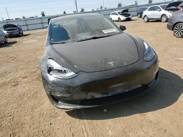 2021 Tesla Model 3 VIN: 5YJ3E1EAXMF076807 Lot: 80486925