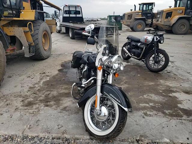 2016 Harley-Davidson Flstn Softail Deluxe VIN: 1HD1JDV13GB044663 Lot: 82111725