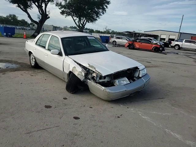 2005 Mercury Grand Marquis Gs VIN: 2MEFM74WX5X664125 Lot: 81063865
