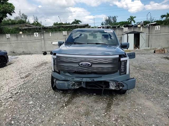 2023 Ford F150 Lightning Pro VIN: 1FTVW1EV9PWG26295 Lot: 80298305