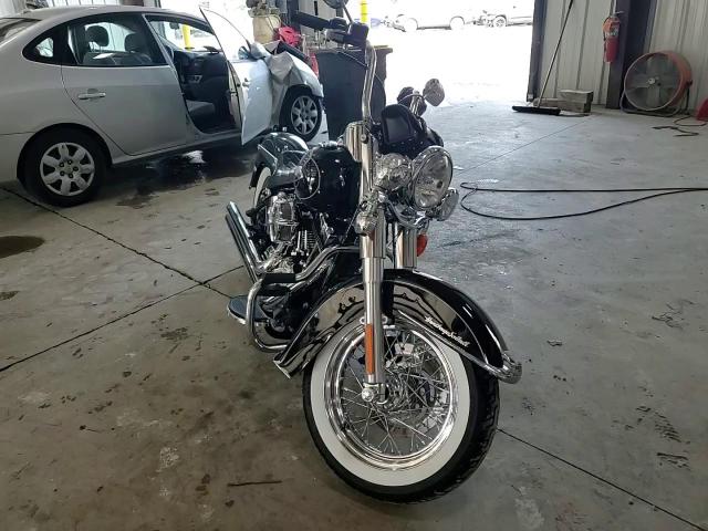 2011 Harley-Davidson Flstc VIN: 1HD1BW51XBB018644 Lot: 71496065