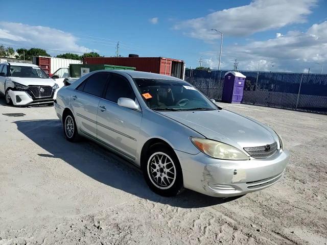 2002 Toyota Camry Le VIN: 4T1BE32K12U562006 Lot: 84642915