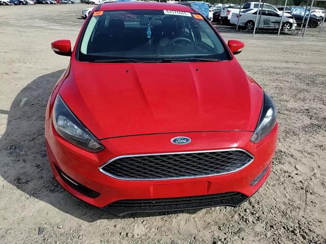 2015 Ford Focus Se VIN: 1FADP3F24FL321771 Lot: 84576665