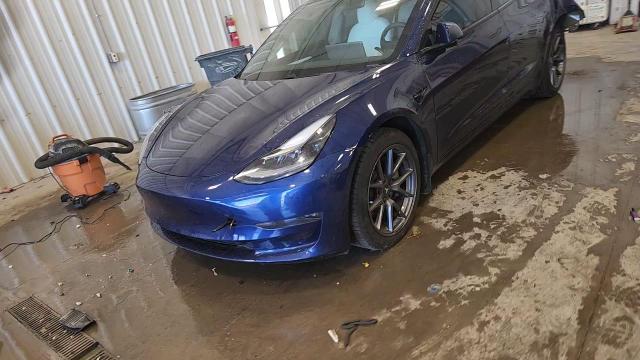 2021 Tesla Model 3 VIN: 5YJ3E1EB0MF975748 Lot: 80466375