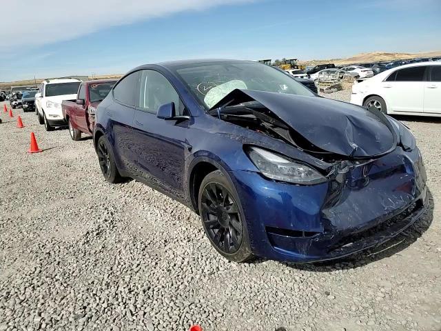 2023 Tesla Model Y VIN: 7SAYGAEE0PF980093 Lot: 76579144