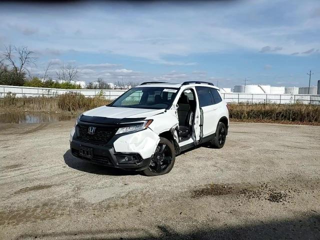 2021 Honda Passport Elite VIN: 5FNYF8H0XMB032286 Lot: 77494094