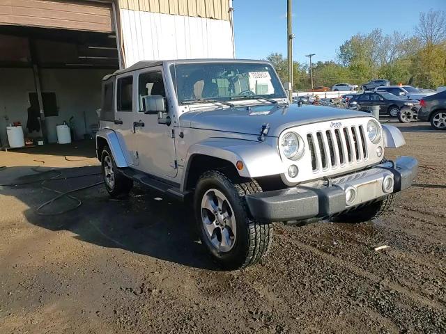 1C4BJWEG4GL129656 2016 Jeep Wrangler Unlimited Sahara