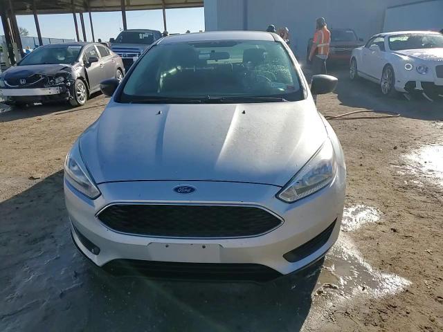 2015 Ford Focus S VIN: 1FADP3E24FL366162 Lot: 77247344