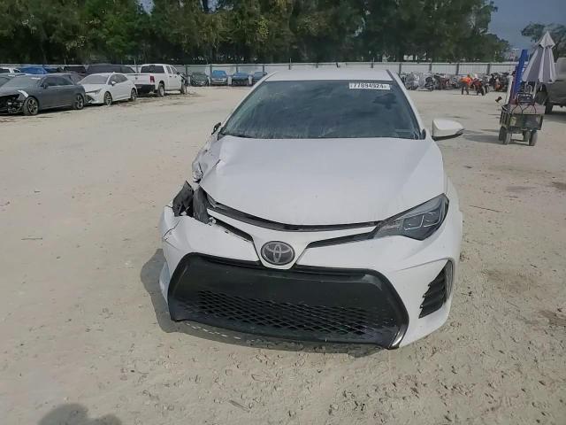 2018 Toyota Corolla L VIN: 5YFBURHE8JP774716 Lot: 77894924