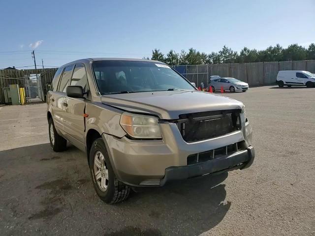 2006 Honda Pilot Lx VIN: 5FNYF28126B005933 Lot: 77912284