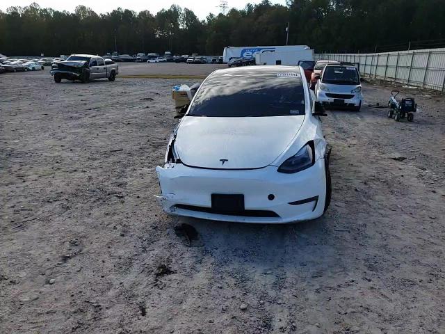 2024 Tesla Model Y VIN: 7SAYGDEF1RA301720 Lot: 75937894