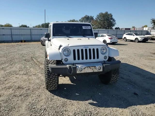 2015 Jeep Wrangler Unlimited Sahara VIN: 1C4BJWEGXFL691026 Lot: 74605824