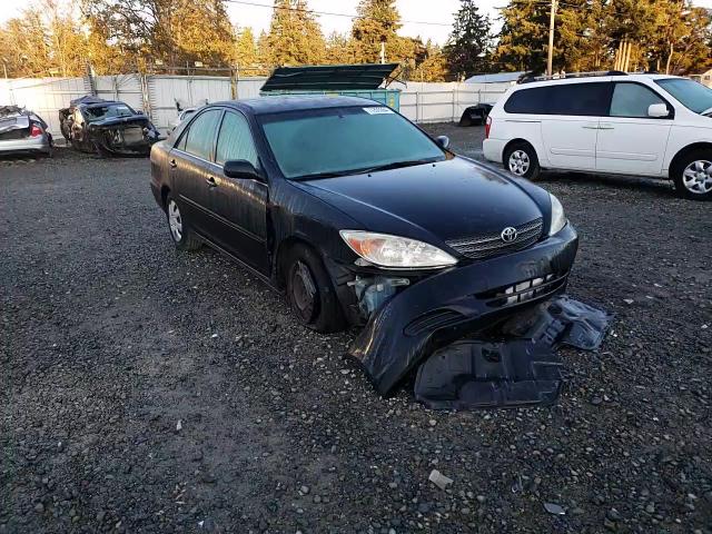 2002 Toyota Camry Le VIN: JTDBE32K620076710 Lot: 77209364