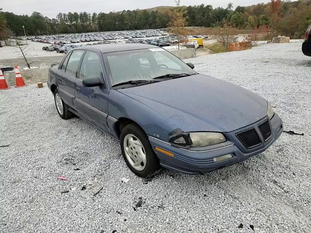 1995 Pontiac Grand Am Se VIN: 1G2NE55M1SC731915 Lot: 77453774