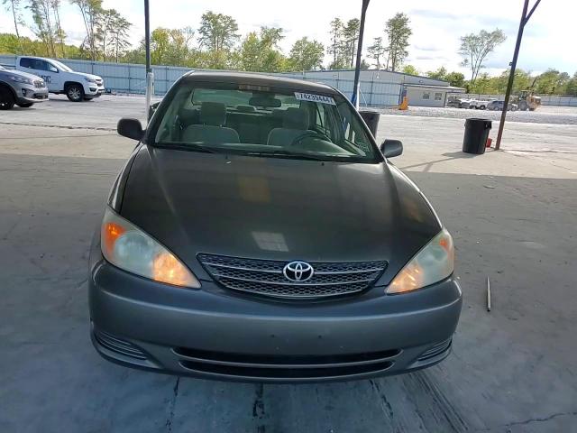 2003 Toyota Camry Le VIN: 4T1BE32K93U699275 Lot: 74239444