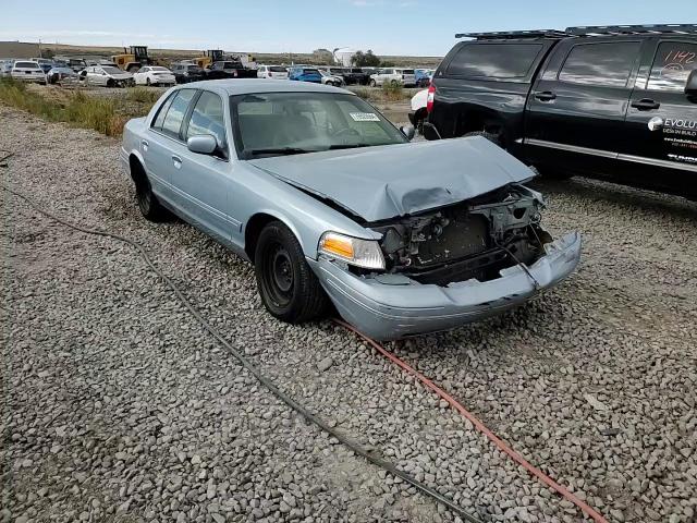 2002 Ford Crown Victoria VIN: 2FAFP73W62X129904 Lot: 76920564