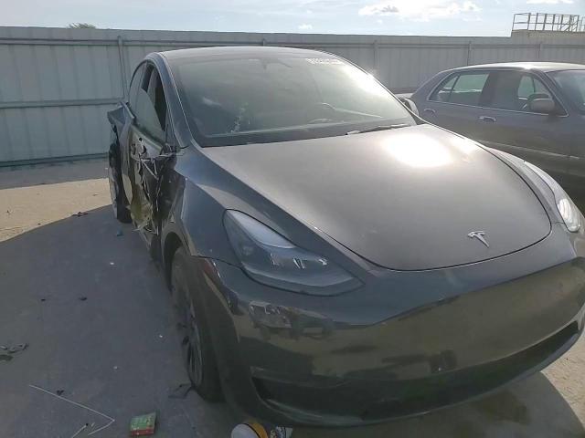 2024 Tesla Model Y VIN: 7SAYGDEE1RF990460 Lot: 78354044