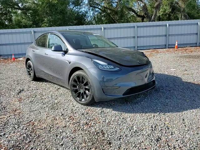 2023 Tesla Model Y VIN: 7SAYGDEE0PA056932 Lot: 78996674