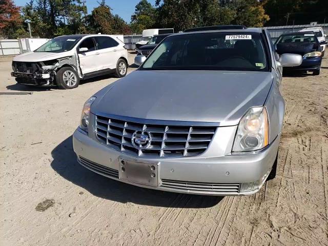 2009 Cadillac Dts VIN: 1G6KD57Y99U127215 Lot: 77579424