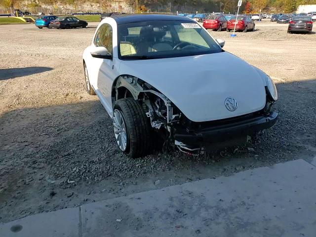 2019 Volkswagen Beetle S VIN: 3VWFD7AT4KM703324 Lot: 77000024