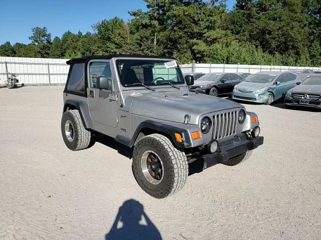 2002 Jeep Wrangler / Tj Sport VIN: 1J4FA49S92P711090 Lot: 76492044