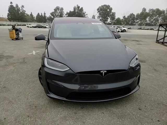 2023 Tesla Model X VIN: 7SAXCBE59PF423230 Lot: 75038164