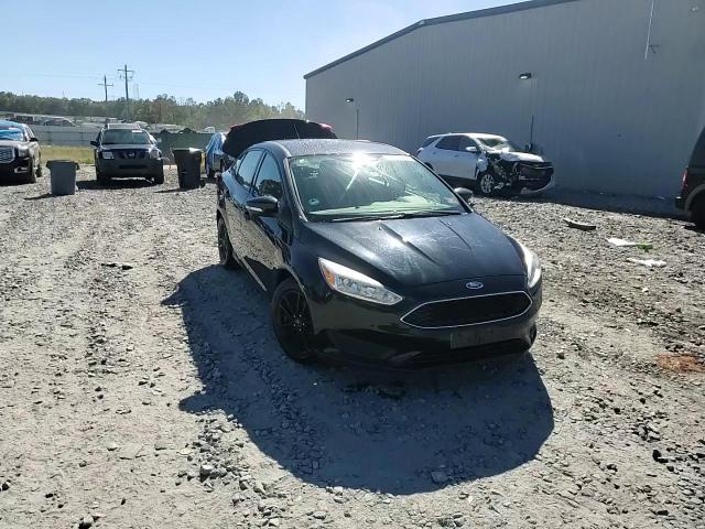 2017 Ford Focus Se VIN: 1FADP3F28HL220557 Lot: 75731404