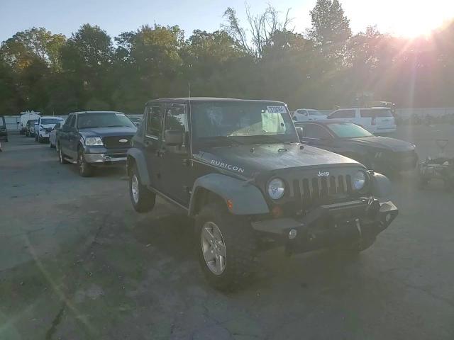 2011 Jeep Wrangler Unlimited Rubicon VIN: 1J4BA6H12BL549605 Lot: 76708384