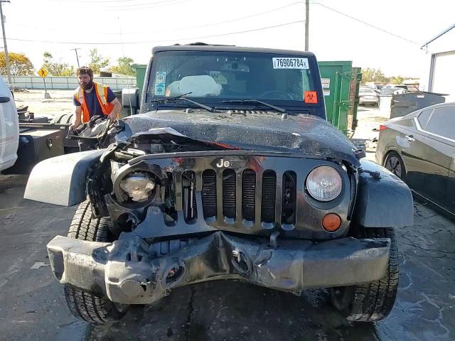 2013 Jeep Wrangler Unlimited Sport VIN: 1C4BJWDG9DL697690 Lot: 76906784