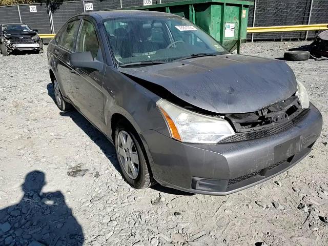 2009 Ford Focus S VIN: 1FAHP34NX9W129126 Lot: 76801094