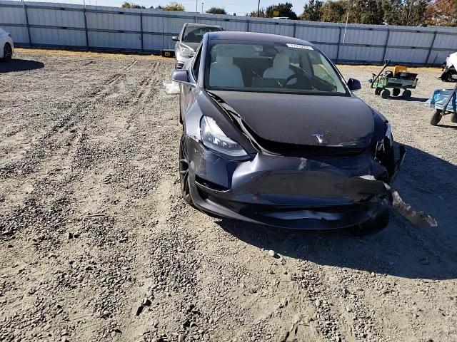 2018 Tesla Model 3 VIN: 5YJ3E1EB7JF100422 Lot: 77915964