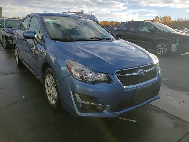 2016 Subaru Impreza Premium VIN: JF1GJAB63GH009019 Lot: 77823684