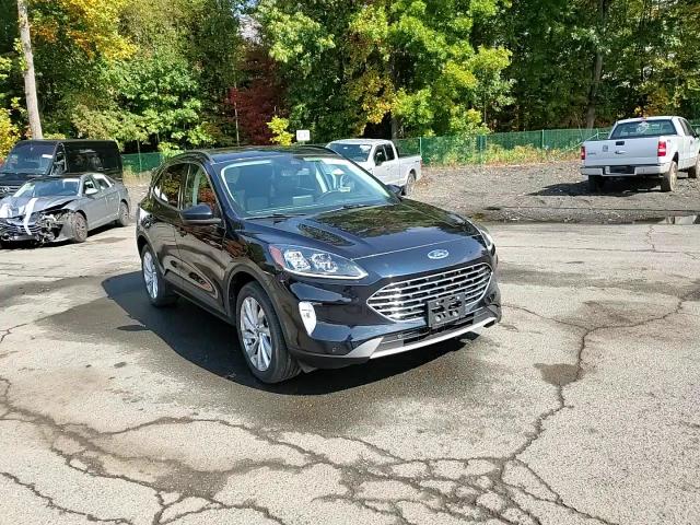 2021 Ford Escape Titanium VIN: 1FMCU9J99MUA17909 Lot: 74874444