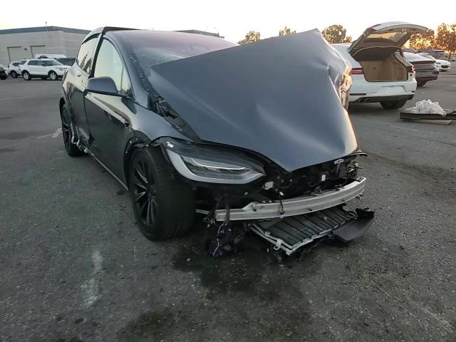 2023 Tesla Model X VIN: 7SAXCBE55PF381834 Lot: 77000564