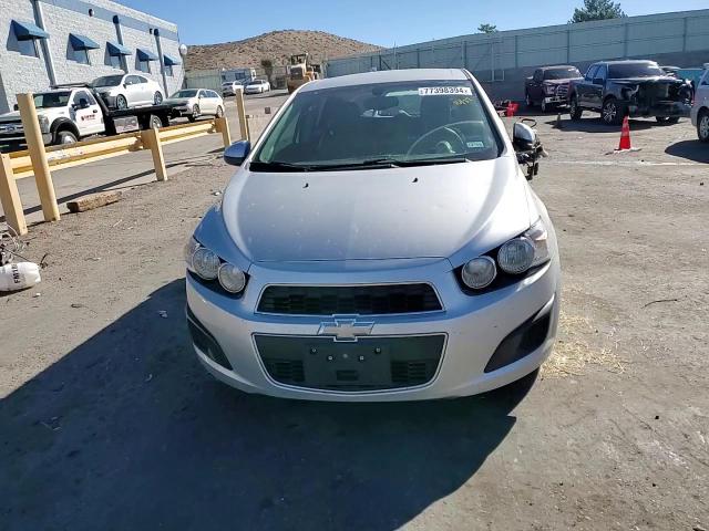 2014 Chevrolet Sonic Ls VIN: 1G1JA6SH8E4143620 Lot: 77398394