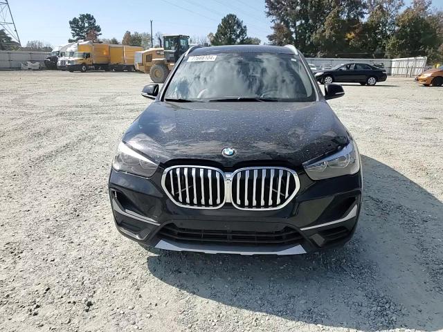 2020 BMW X1 Sdrive28I VIN: WBXJG7C09L5P99565 Lot: 77666104