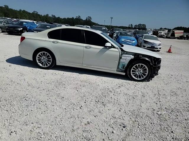 2012 BMW 750 I VIN: WBAKA8C57CDS99573 Lot: 74575674